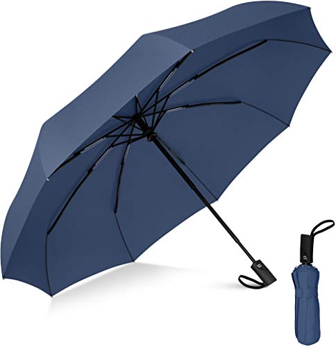 Revisión reforzada de un paraguas de viaje compacto de compañero de lluvia
